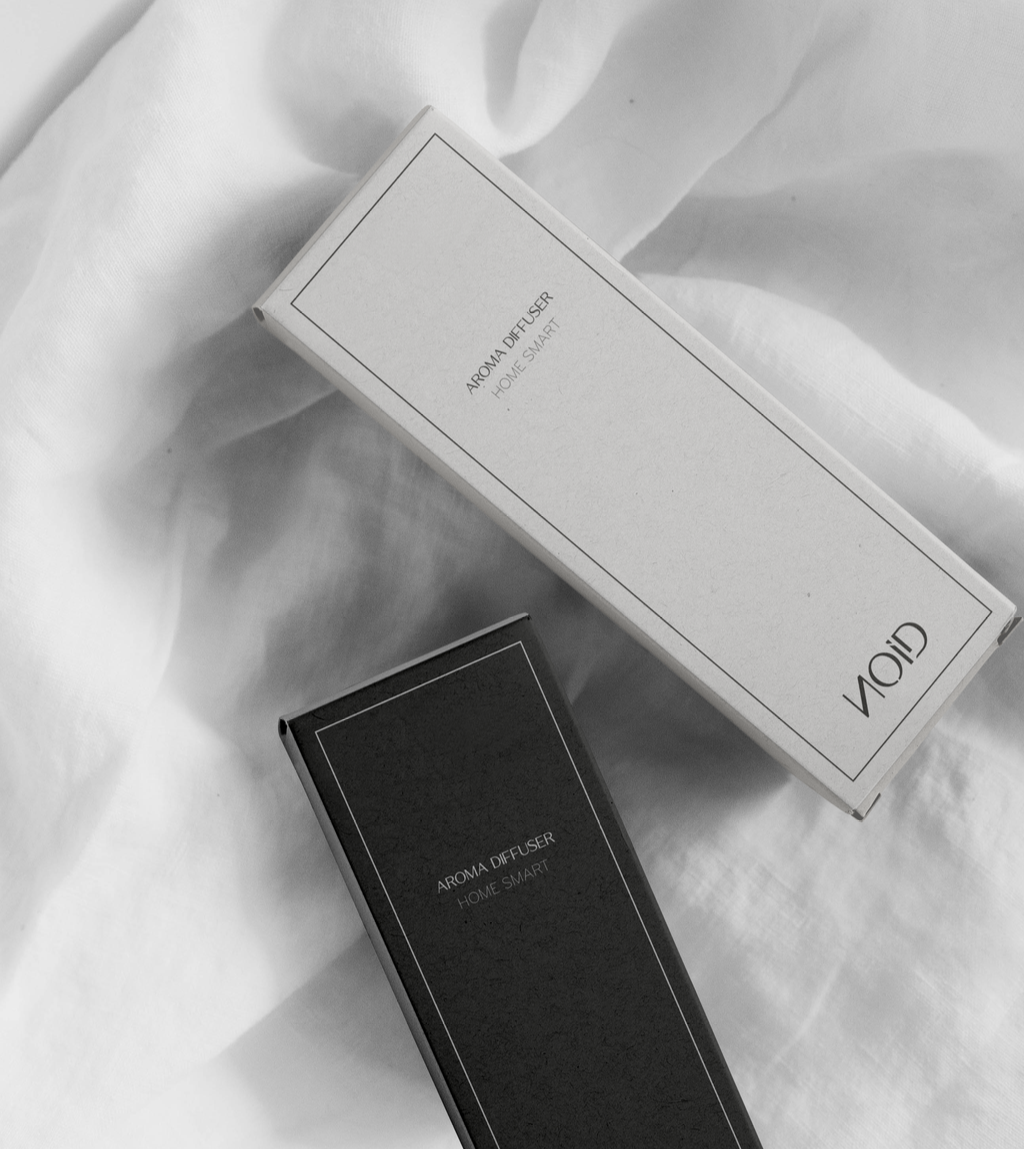 Empaque del Nebulizador NOID sobre textil blanco